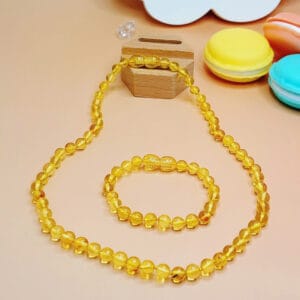 Bộ dây chuyền và lắc tay hổ phách vàng trong Le'Mare Jewelry - món quà ý nghĩa dành cho bé yêu các dịp thôi nôi, đầy tháng, sinh nhật và các ngày kỷ niệm đặc biệt ...