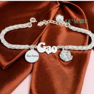 Lắc xà tích bạc ta thiết kế tên (F2) cho bé mix rồng và charm khắc tên, ngày sinh kèm chuông Le’Mare Jewelry - món quà ý nghĩa dành cho bé yêu các dịp thôi nôi, đầy tháng, sinh nhật và các ngày kỷ niệm đặc biệt …